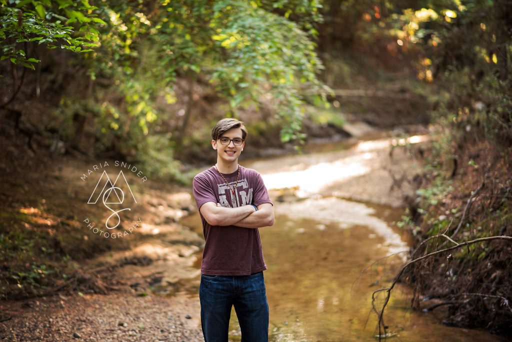 Woodlands senior in the forest