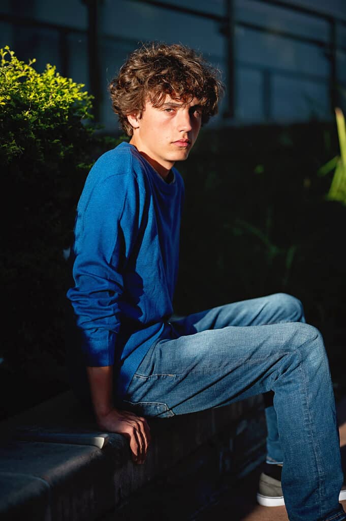 blue sweater, serious senior session